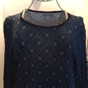 Blue blouse with floral print trim